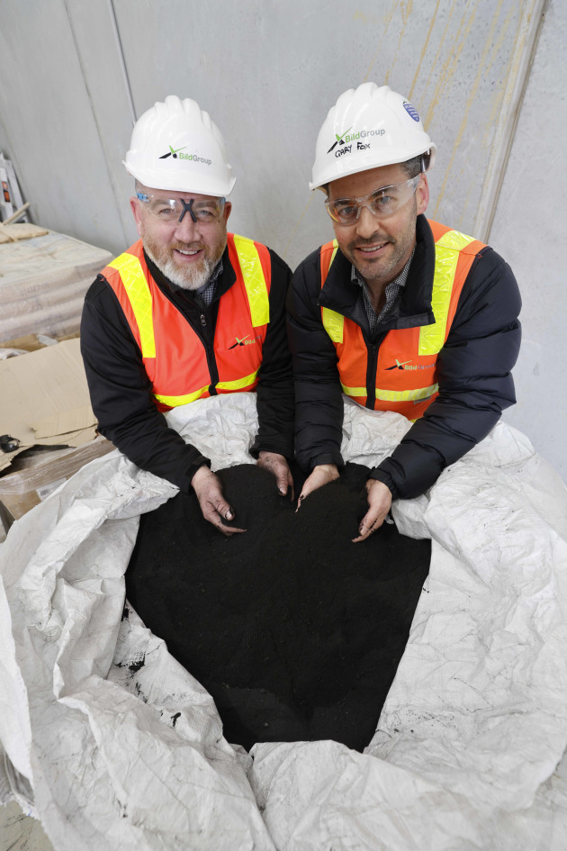 George Dalton and Gary Fox from BildGroup with the coffee biochar, ready to mix into concrete.
Source: HiVis Pictures