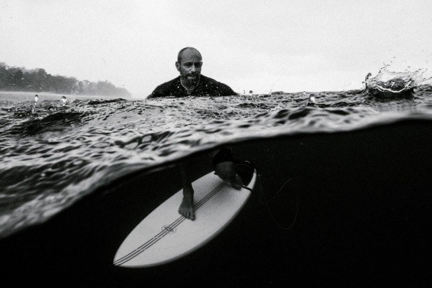 © Russell Ord. Tom Carroll portrait in the tropical rain Indonesia.