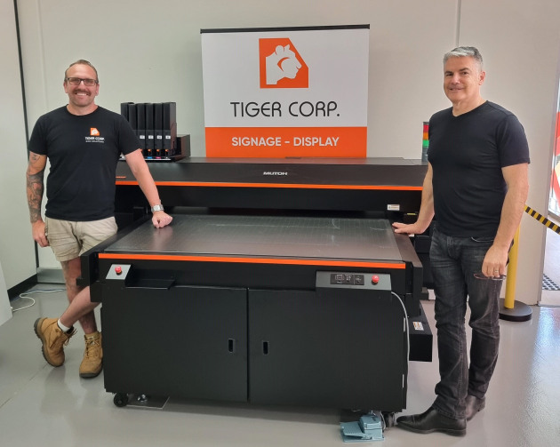 First in Australia: Tiger Corp director Larry Sbisi (right) with production manager Justin Maroszek (left), and the new Mutoh XpertJet 1462UF printer