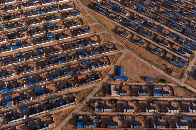 © Josh Haner/The New York Times. China calls them “ecological migrants”: 329,000 people whom the government has relocated from lands distressed by climate change, industrialization, poor policies, and human activity to 161 hastily built villages. One of these villages, Miaomiaohu Lake, is now home to 7,000 Hui Muslims, moved from their water-scarce lands in the country’s northwest.