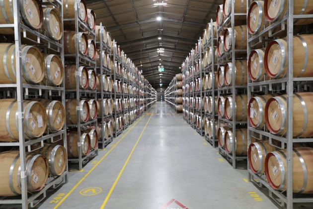 More than 100 million litres of wine will be produced at Treasury Wine Estates’ new production facility in South Australia’s Barossa Valley, said to be the largest in the Southern Hemisphere. 
It is the first wine production facility to use Automated Guided Vehicles to manage barrel movements.