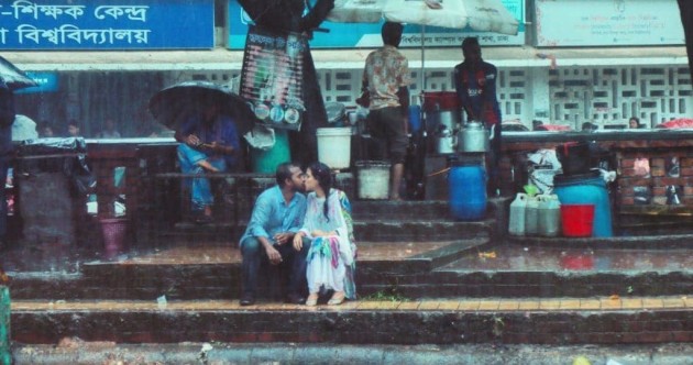 Two lovers kiss in the rain in Dhaka, Bangladesh. © Jibon Ahmed.