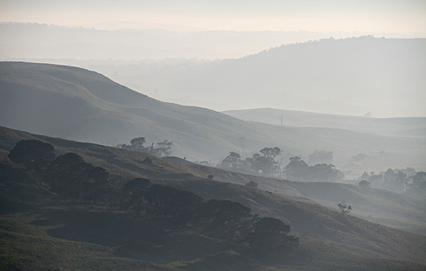 One of the handy features of shooting with a telephoto lens is that perspective is flattened. This can be used for creative purposes in flattening scenery into semi-abstract patterns.