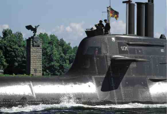 The German Navy TKMS Type 212 which completed a record submerged transit by a non-nuclear submarine without snorkelling, passes the U-Boat memorial outside Kiel. Credit: TKMS