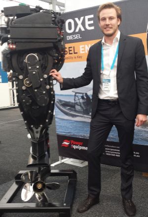 Luke Foster of Power Equipment with the Oxe diesel outboard at Pacific15 in Sydney.