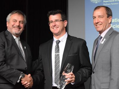 (L-R) Chief Defence Scientist Dr Alex Zelinsky, Minister's Award winner Dr Mark Patterson, and the Minister for Defence Materiel and Science Mal Brough. Credit: DST Group