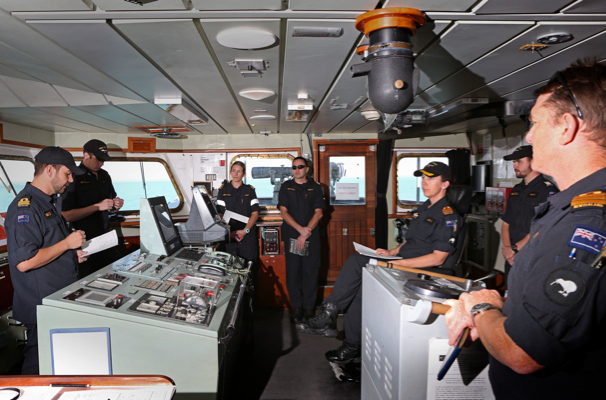 RNZN officers brief the Commanding Officer of HMNZS Endeavour, before departing Fort Hill Wharf, Darwin at the end of their duties in Exercise Talisman Sabre