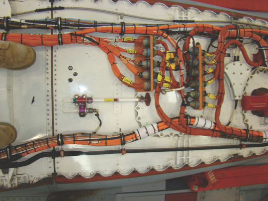 "Orange wiring" permanently installed within an ARDU Hornet. Credit: Defence