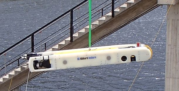 The Sabretooth is lowered into the water near a tunnel intake. Credit: Hibbard Inshore