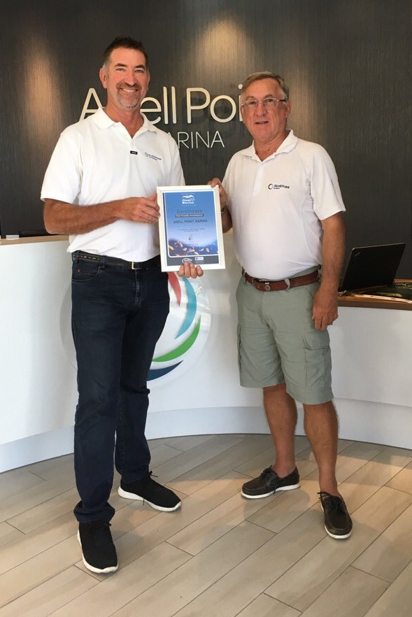 John Hogan CMP (left) with Ross Paterson, Abell Point Marina's infrastructure manager, who was on hand to receive the Fish Friendly Marina certificate.