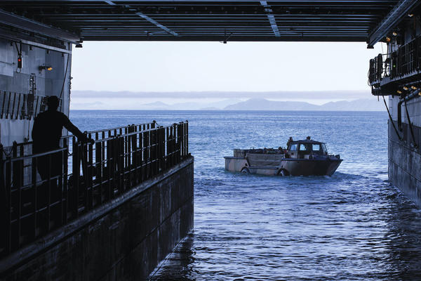 An Australian Army light amphibious vehicle from 10th Force Support Battalion leaves HMAS Adelaide during Exercise Sea Explorer 2016, off the coast of North Queensland, Australia, on 28 June 2016.