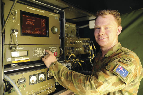 Satellite technician, Leading Aircraftman Chris Bennett, works on a data link to Australia whilst deployed on Operation PAKISTAN ASSIST II. Credit: Defence