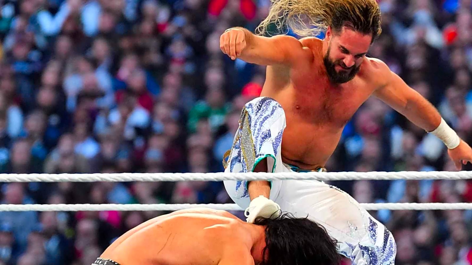 Seth Rollins&#39; Golden Peacock Coat He Wore On Raw Costs $14,000