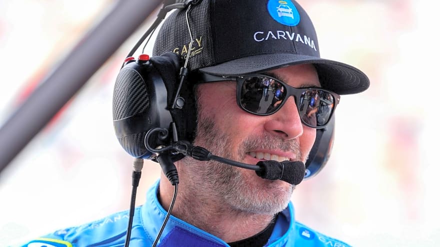 Jimmie Johnson Gifts Toyota Chairman Akio Toyoda His Helmet and a Bottle of Bourbon as American Racecars Arrive in Japan