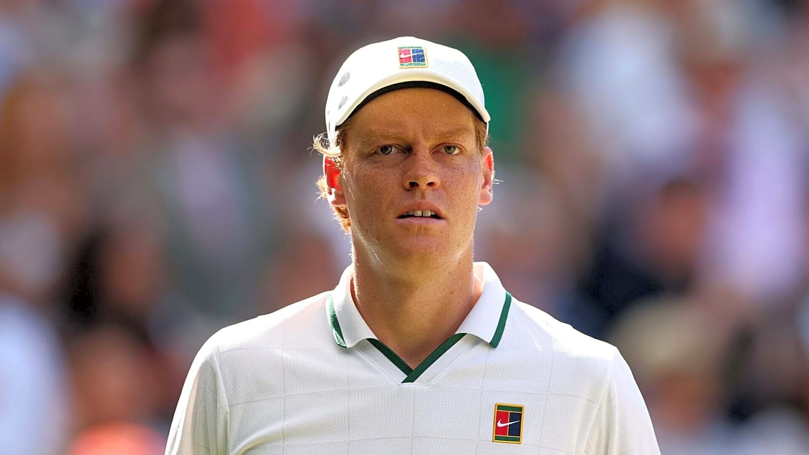 Jannik Sinner holding the Wimbledon trophy during the 2026 season