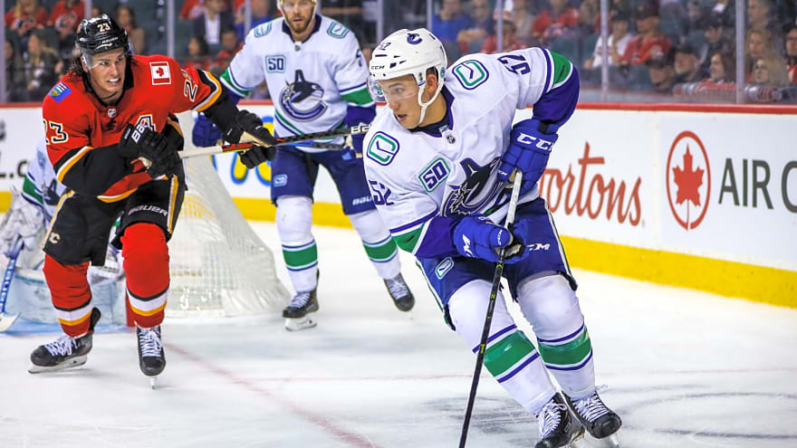 Canucks qualify Woo and Tolopilo; allow McWard, Nielsen, Glover, and Felton to hit free agency