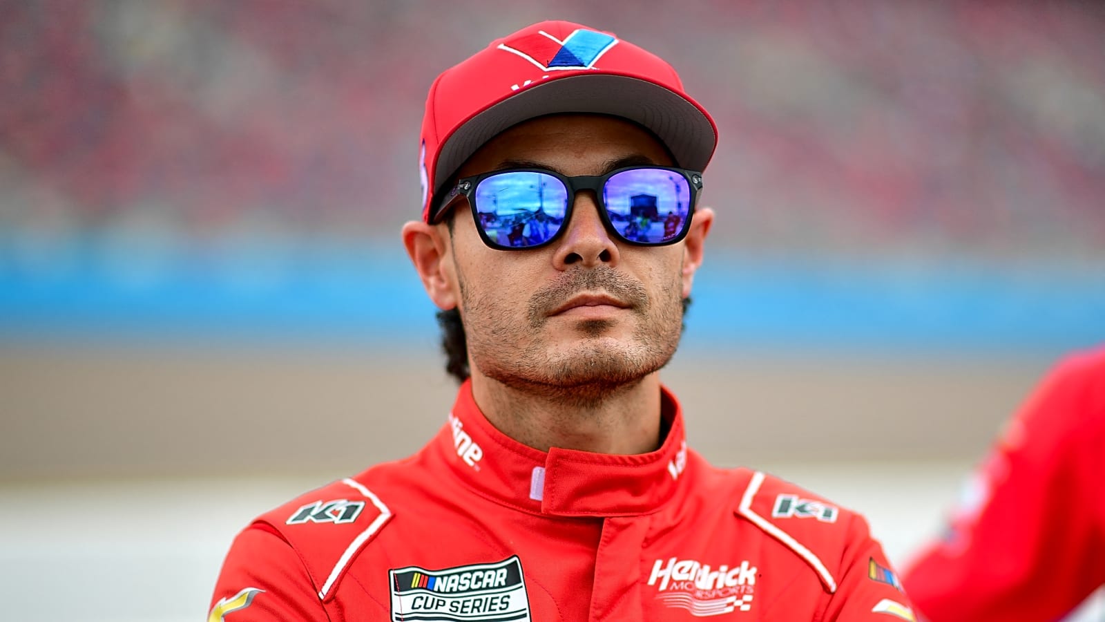 Larson fortunate to retain NASCAR points lead after disastrous race