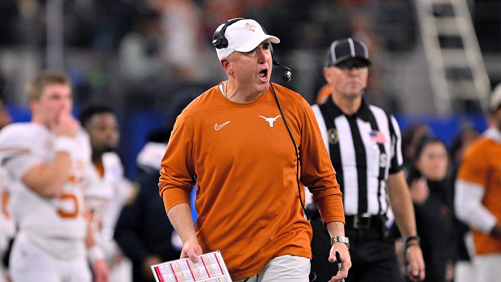 Texas Longhorns OL coach Kyle Flood says right tackle is up for grabs but thinks his unit has a distinct advantage