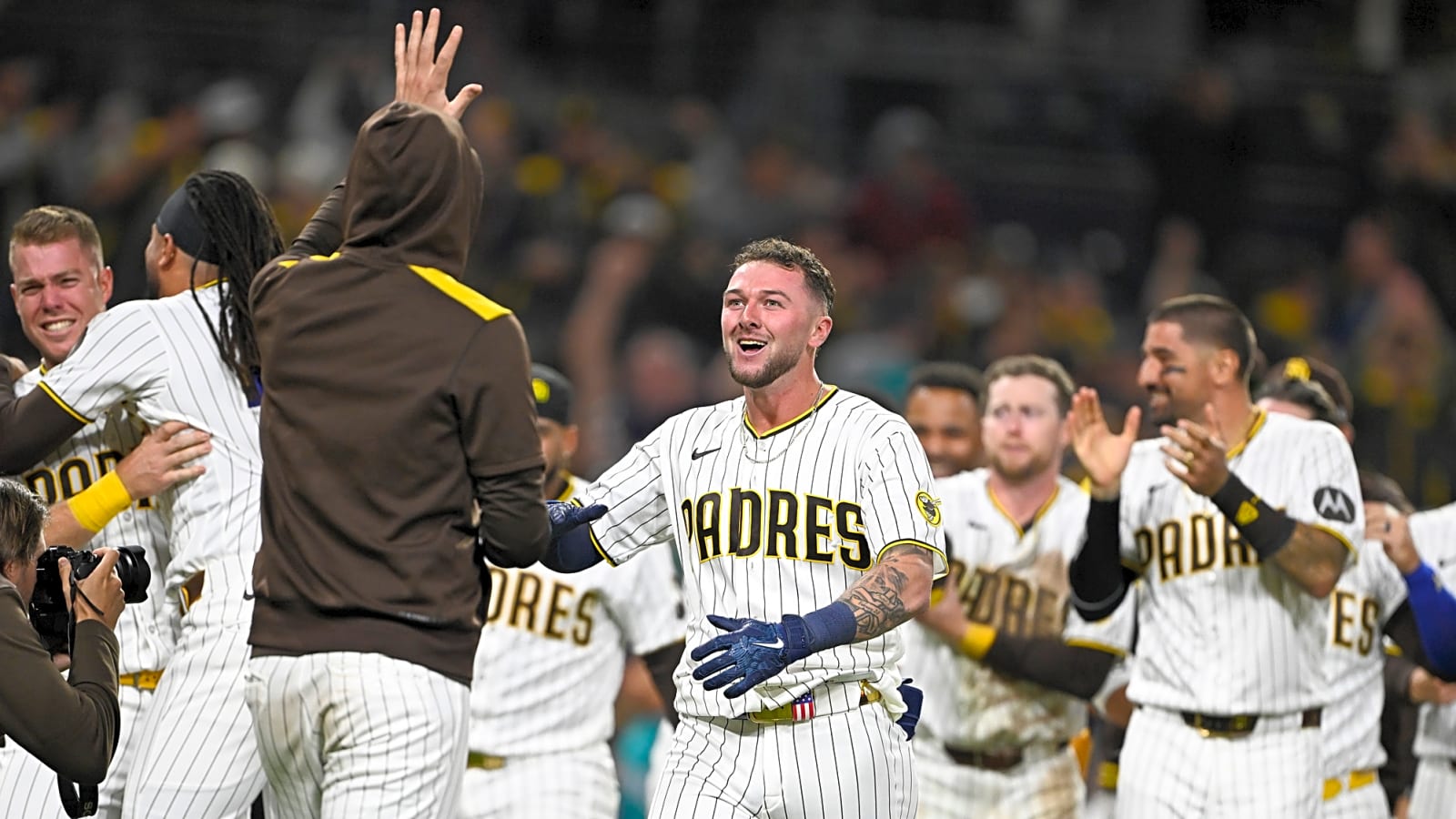 Watch: Padres fans nearly come to blows amid giveaway chaos
