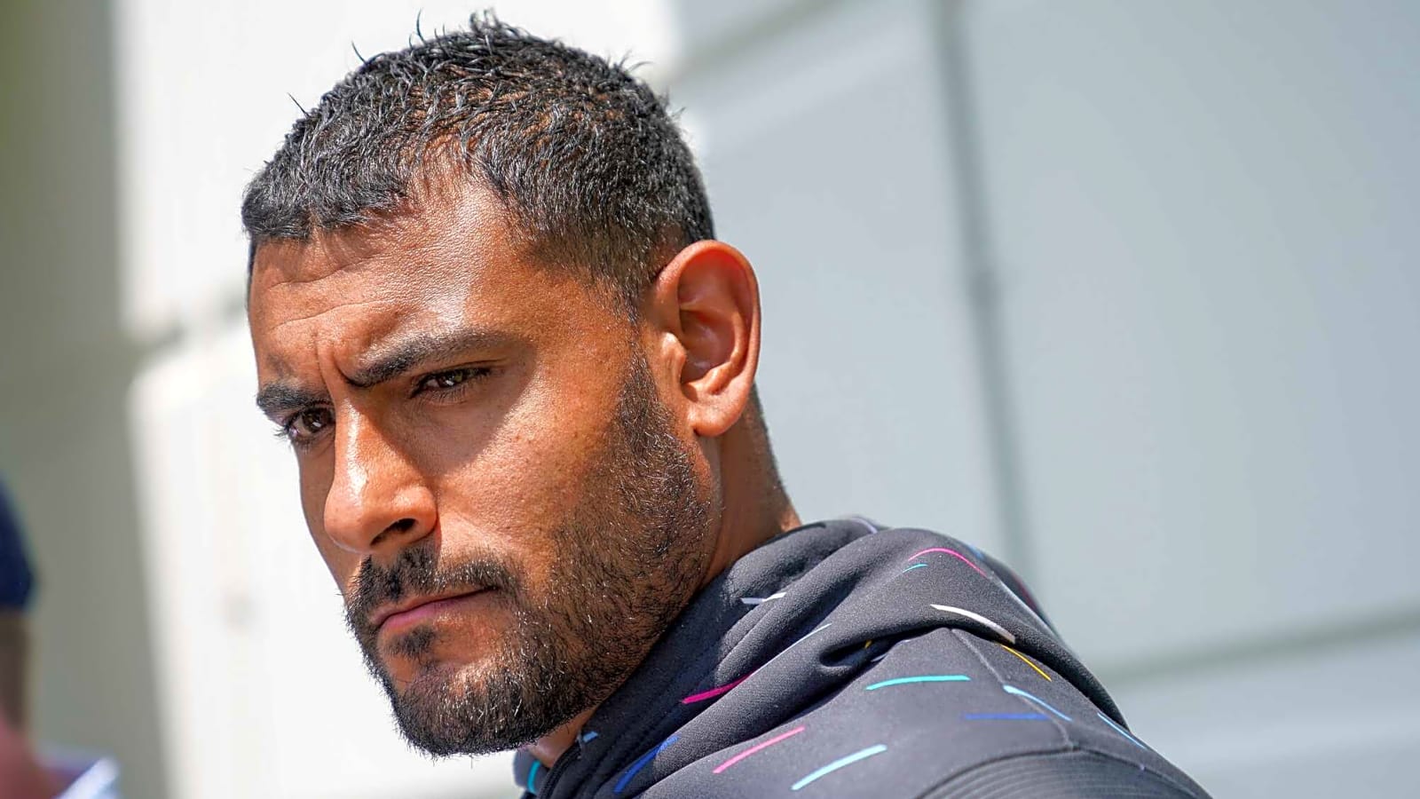 Dolphins coach placed on leave after being arrested