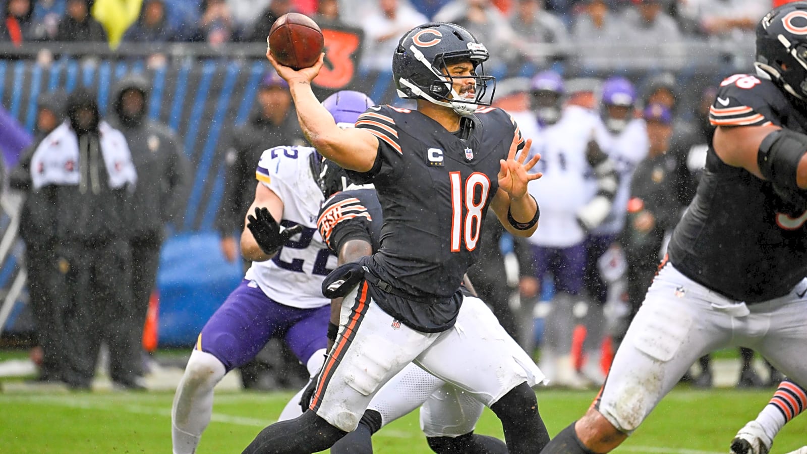 Caleb Williams injury update showing QB walking off the field
