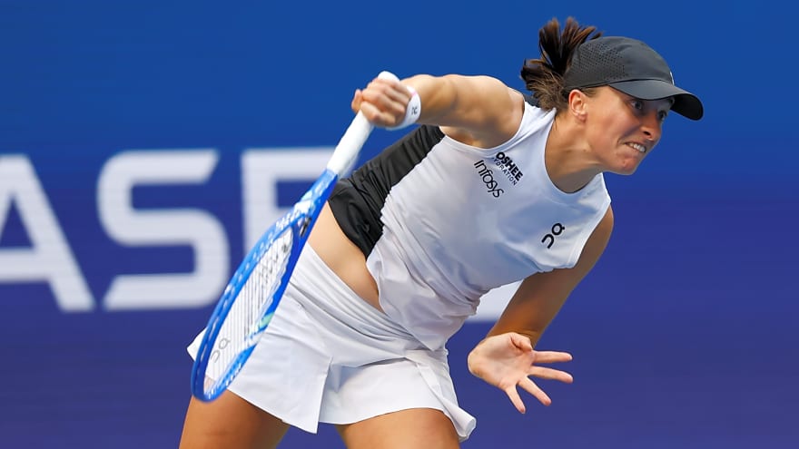 Iga Swiatek reacts after winning Billie Jean King Cup Heart Award 2025