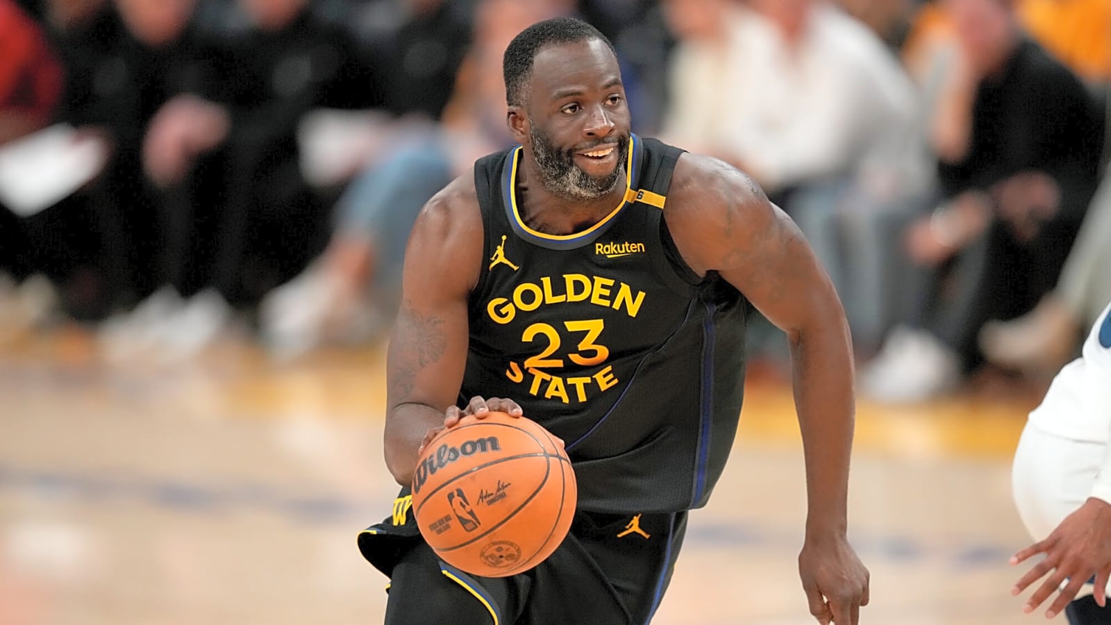 Watch: Draymond Green puts fan wearing Jordan Poole jersey in headlock
