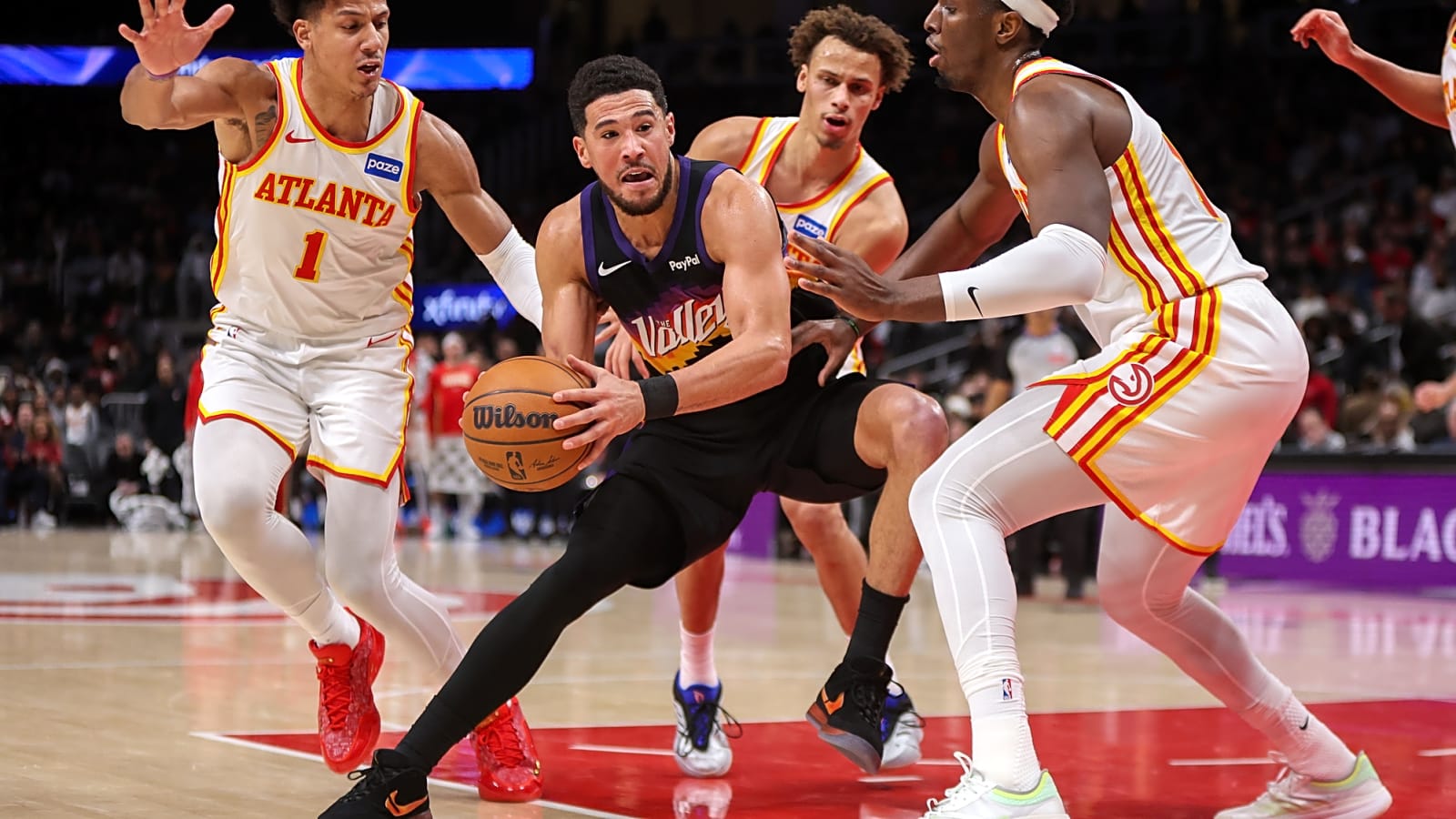 Devin Booker Injures Right Ankle Friday