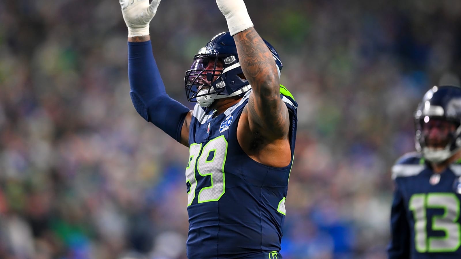 Leonard Williams swipes at Davis Allen during Rams-Seahawks game