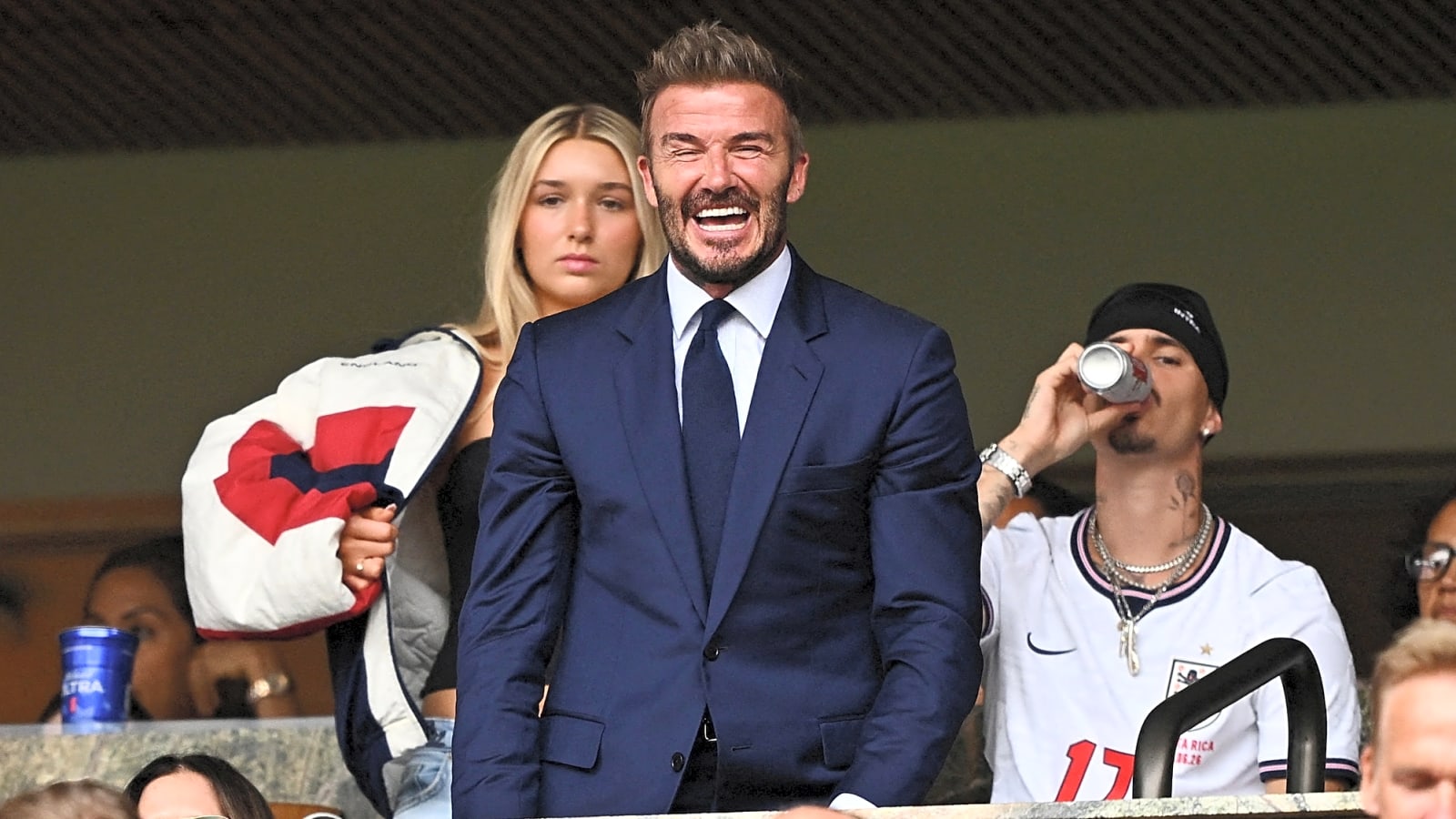 Gary Neville and David Beckham officially sign international midfielder