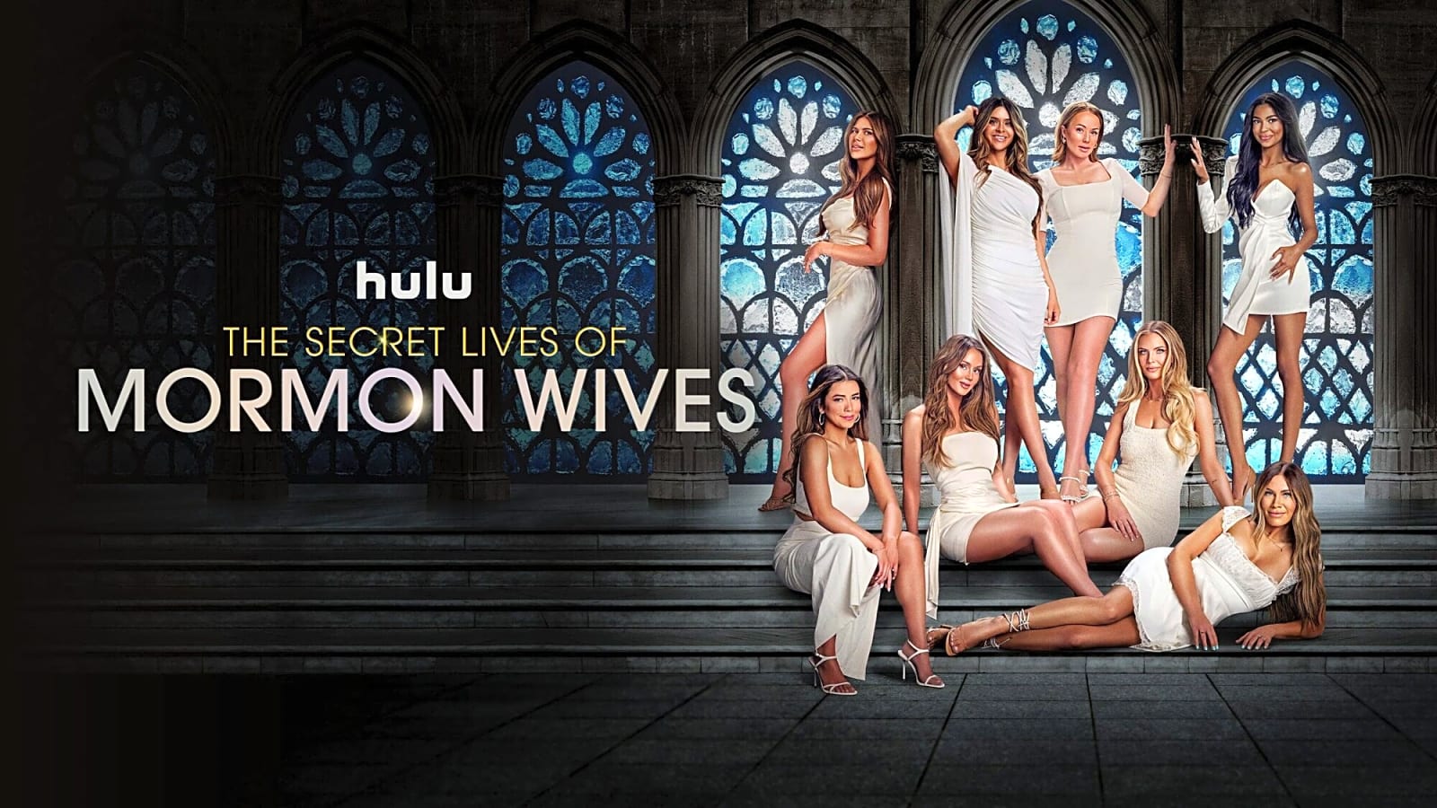 cast of 'The Secret Lives of Mormon Wives' in all white on a staircase