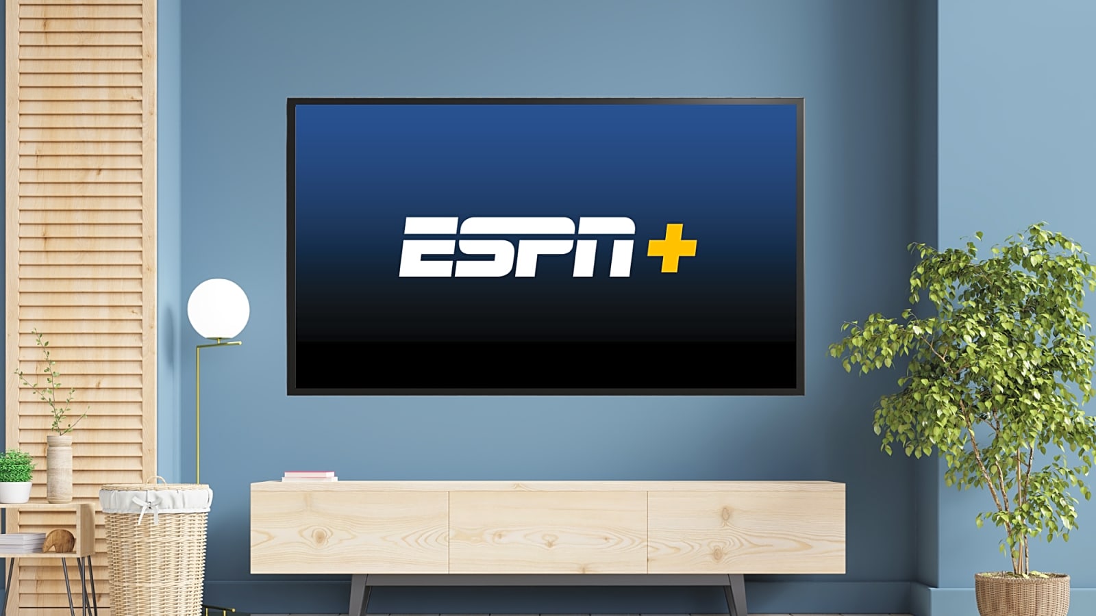 The ESPN Plus Logo On A Black Flat Screen TV Which Is Wall Mounted In A Chic New-Age Living Room