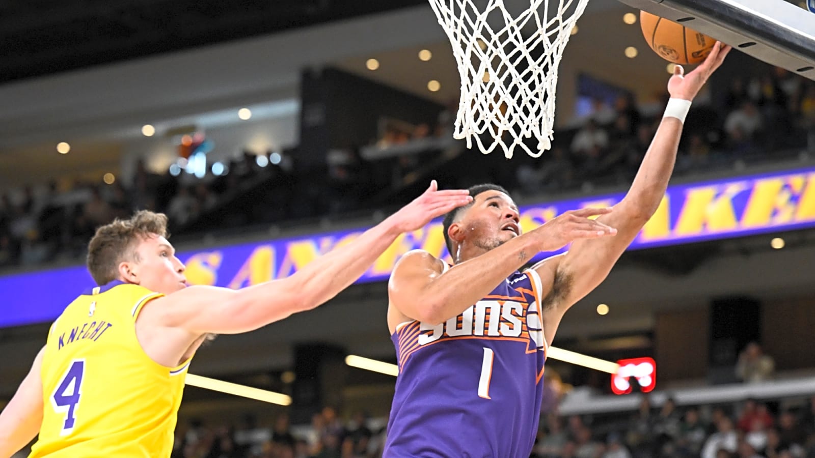 Phoenix Suns SG Devin Booker caught trash talking former teammate DeAndre Ayton