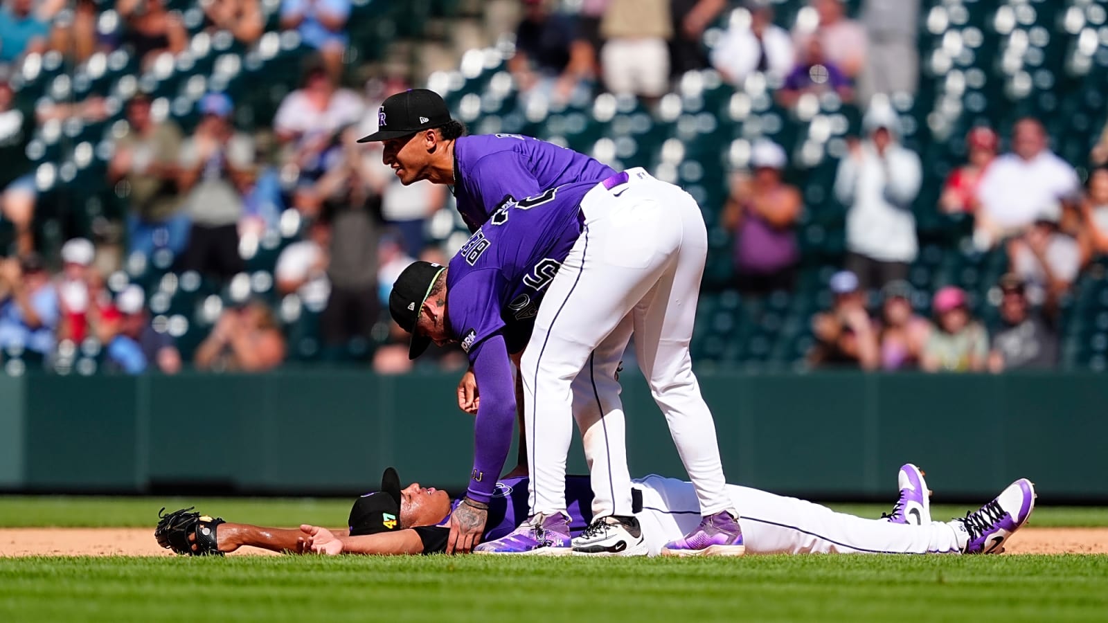 Rockies pitcher smashes into his teammate while chasing a popup