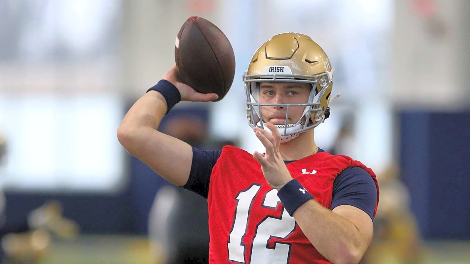 Grandson of legendary Michigan coach wins starting QB job at rival school