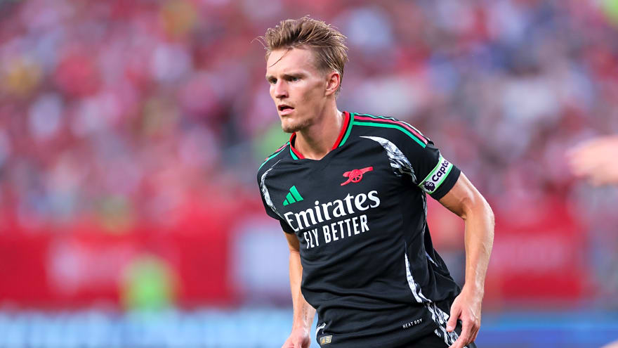 Arsenal scrape a draw at impressive Brentford