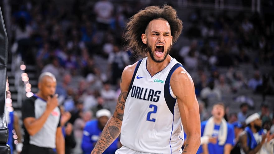 Mavericks exercise option on promising big man
