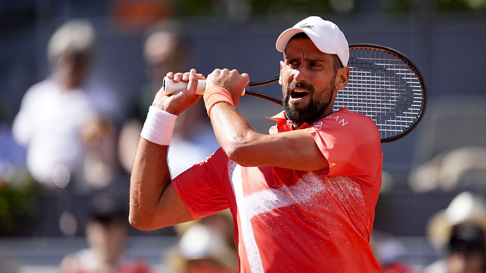 'It is not his best surface to begin with' - John Isner believes Novak Djokovic is focused on winning one tournament this season