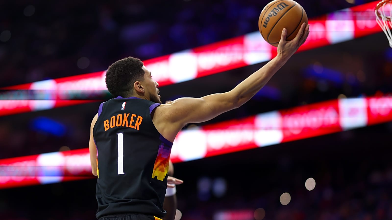 Suns’ Devin Booker injures ankle, leaves game against Hawks
