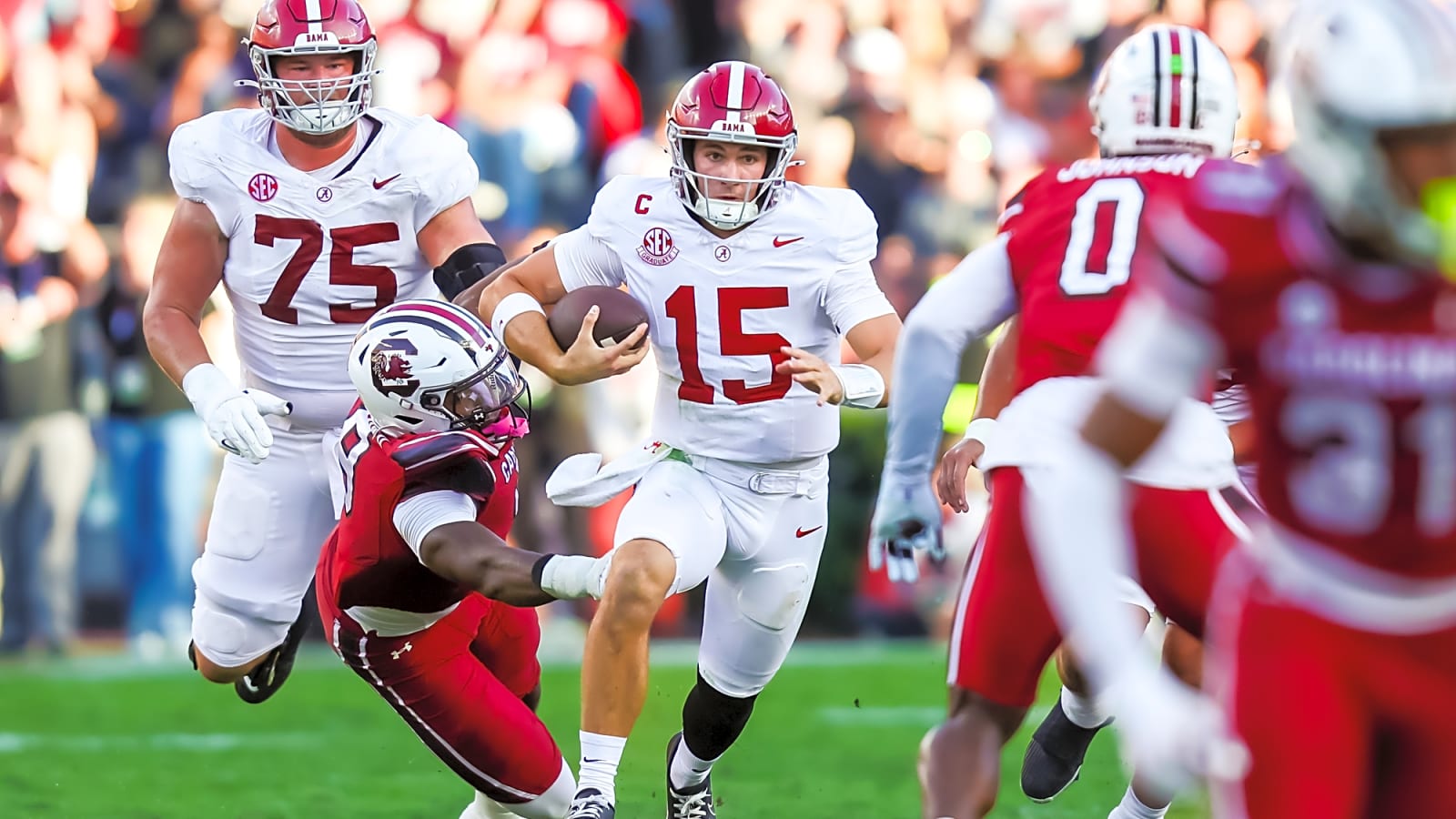 President Trump reacts to Alabama beating South Carolina while speaking to U.S. troops