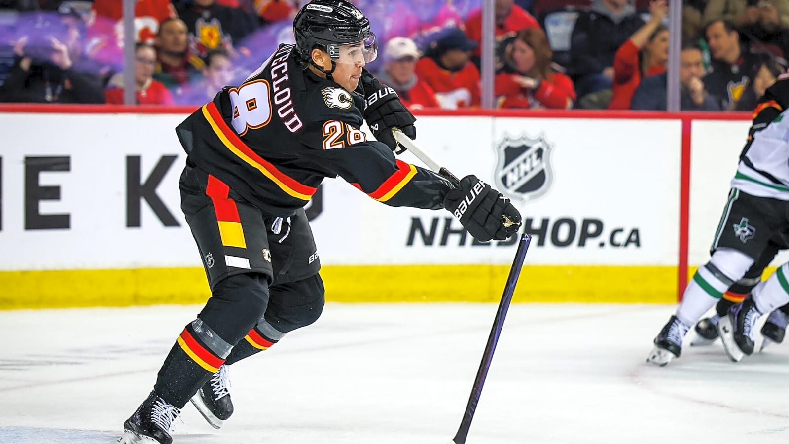 Flames’ Zach Whitecloud exits game with upper-body injury