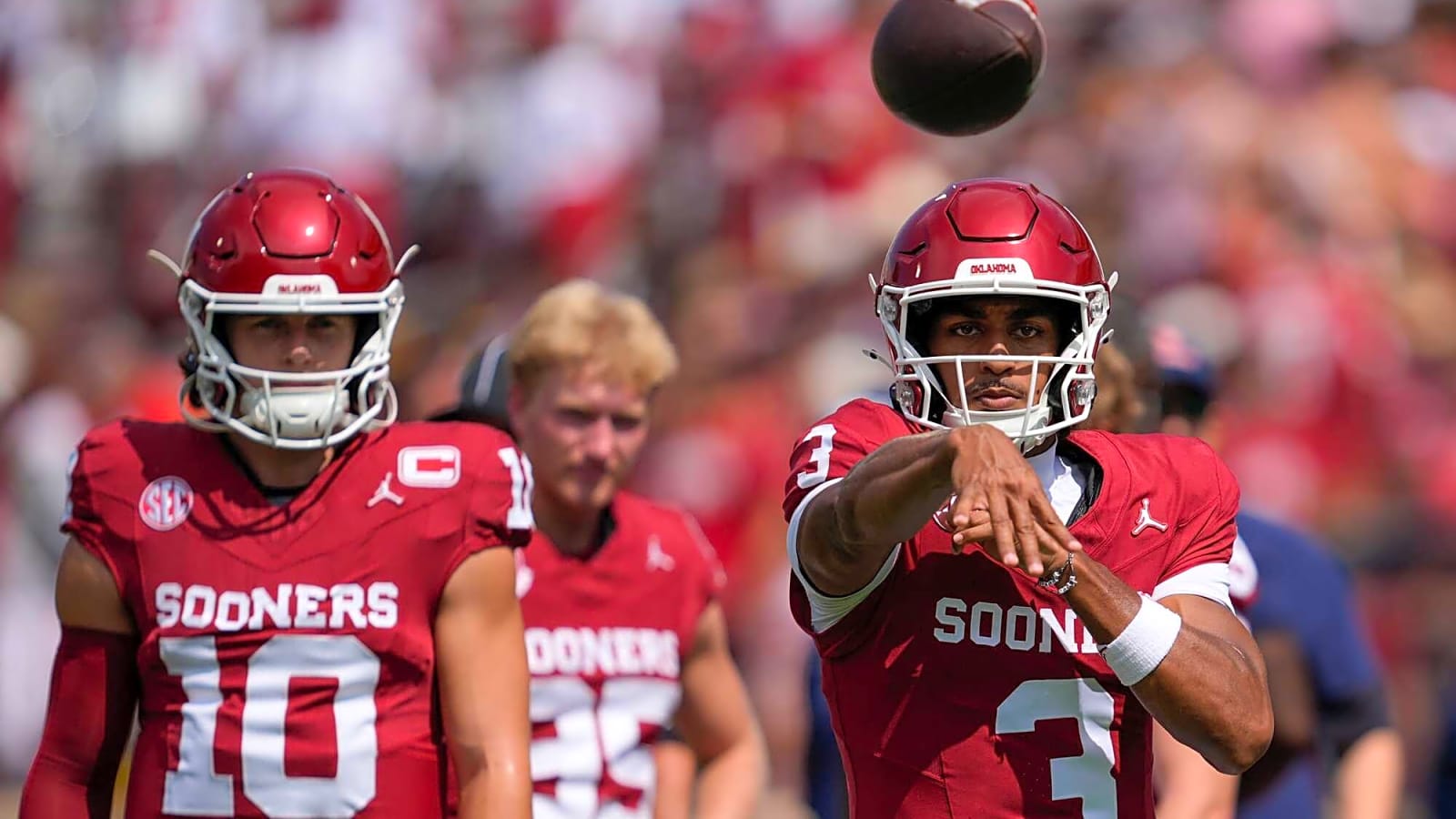 Oklahoma Sooners quarterback Michael Hawkins Jr. warms up before a college football game