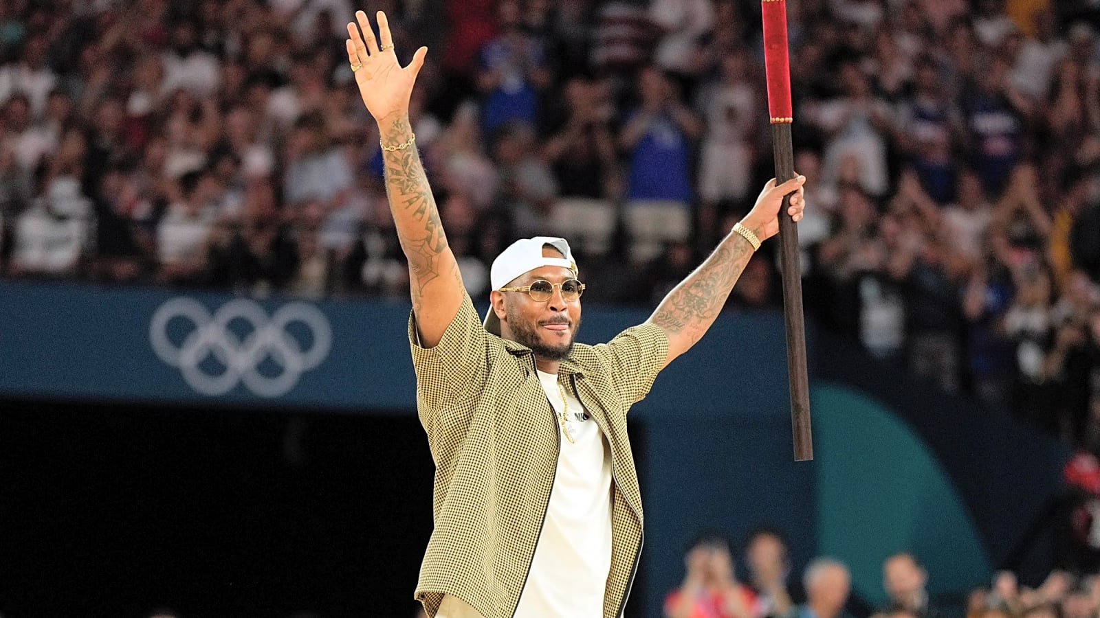 Carmelo Anthony takes on a basketball role at his high school alma mater