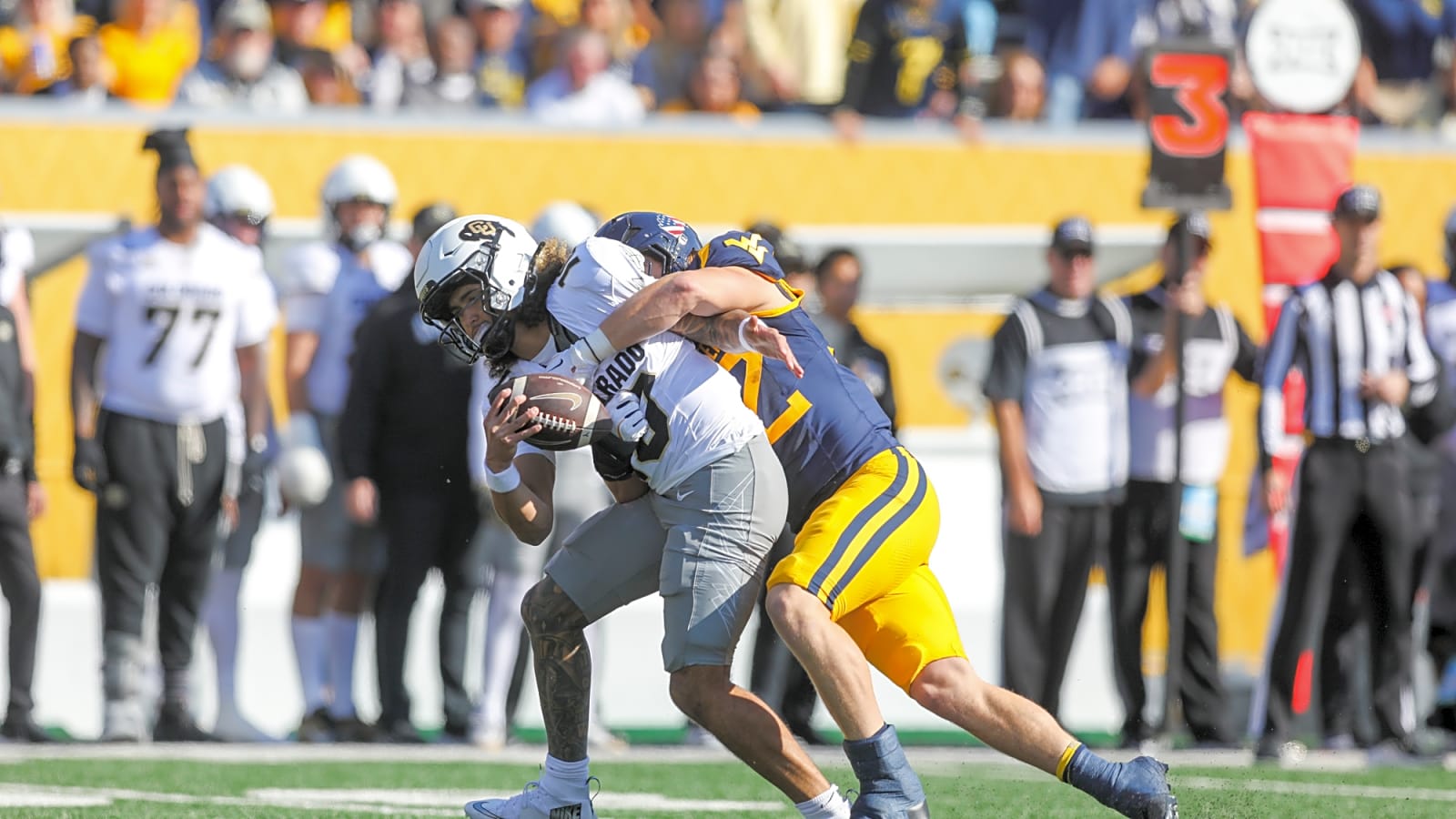 Colorado QB Julian Lewis gets brutally pulled down by his hair during loss to West Virginia
