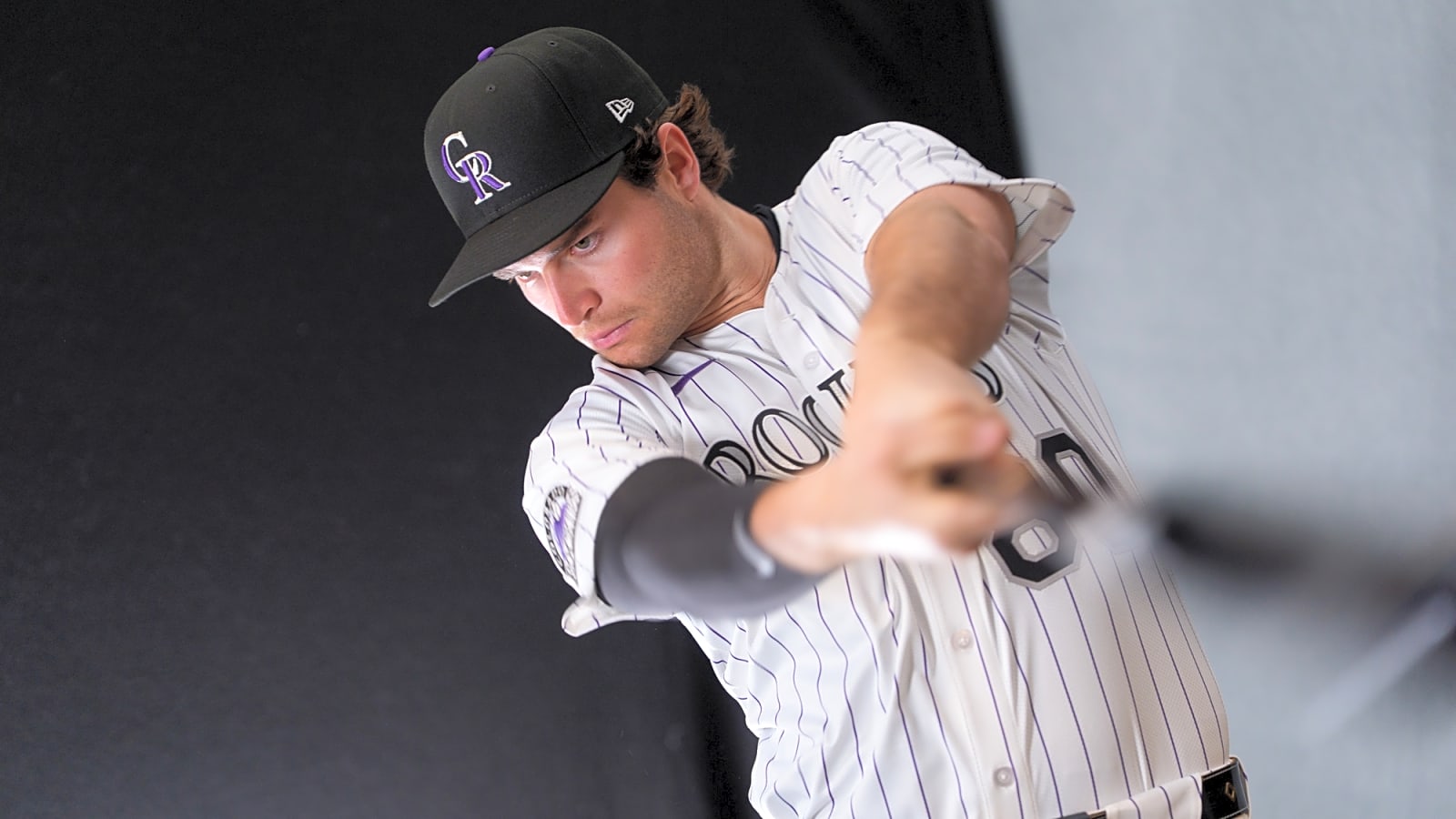 Rockies select contract of two infielders