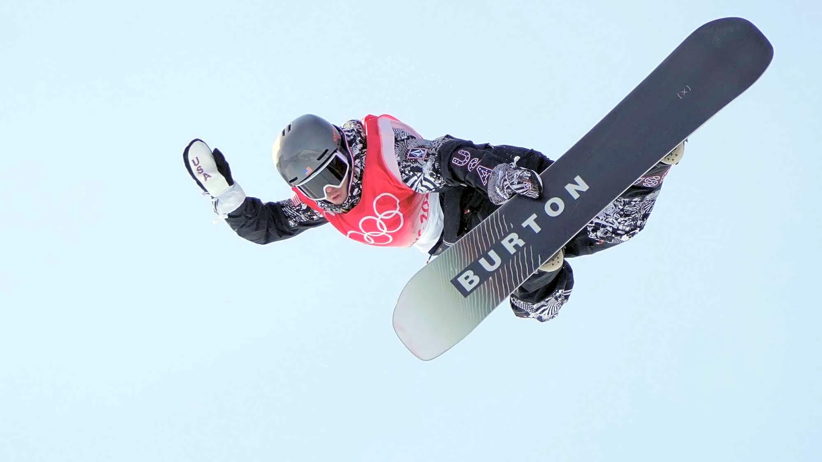 Red Gerard hitting a method grab during slopestyle snowboarding final 2022 olympics