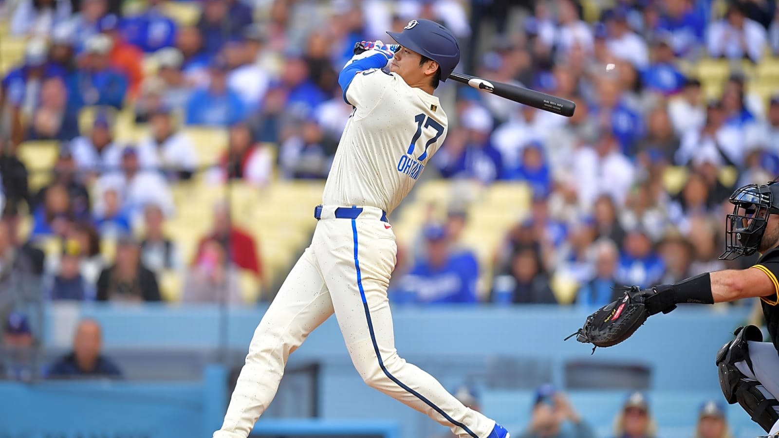 Shohei Ohtani, the Dodgers superstar, in motion swinging the baseball bat over his shoulder in a 2025 matchup