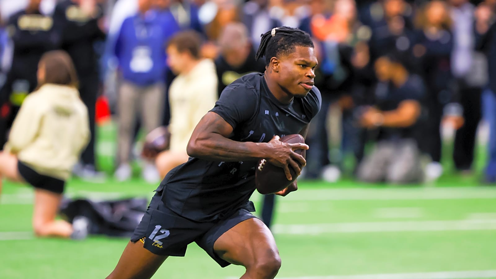 Why Cowboys trading up for Travis Hunter would be worth it
