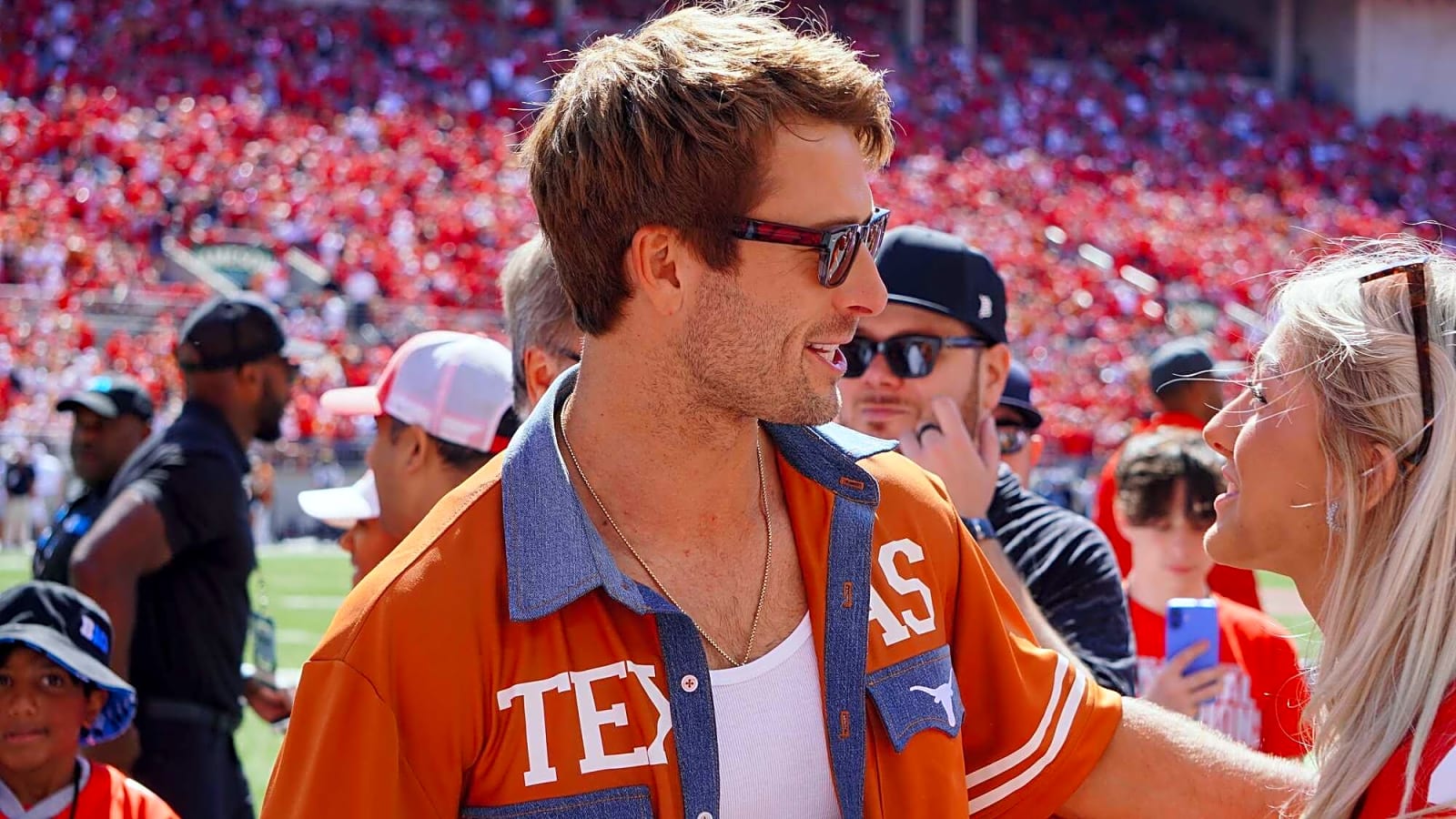 Glen Powell at the NCAA football game between Ohio State and Texas Longhorns