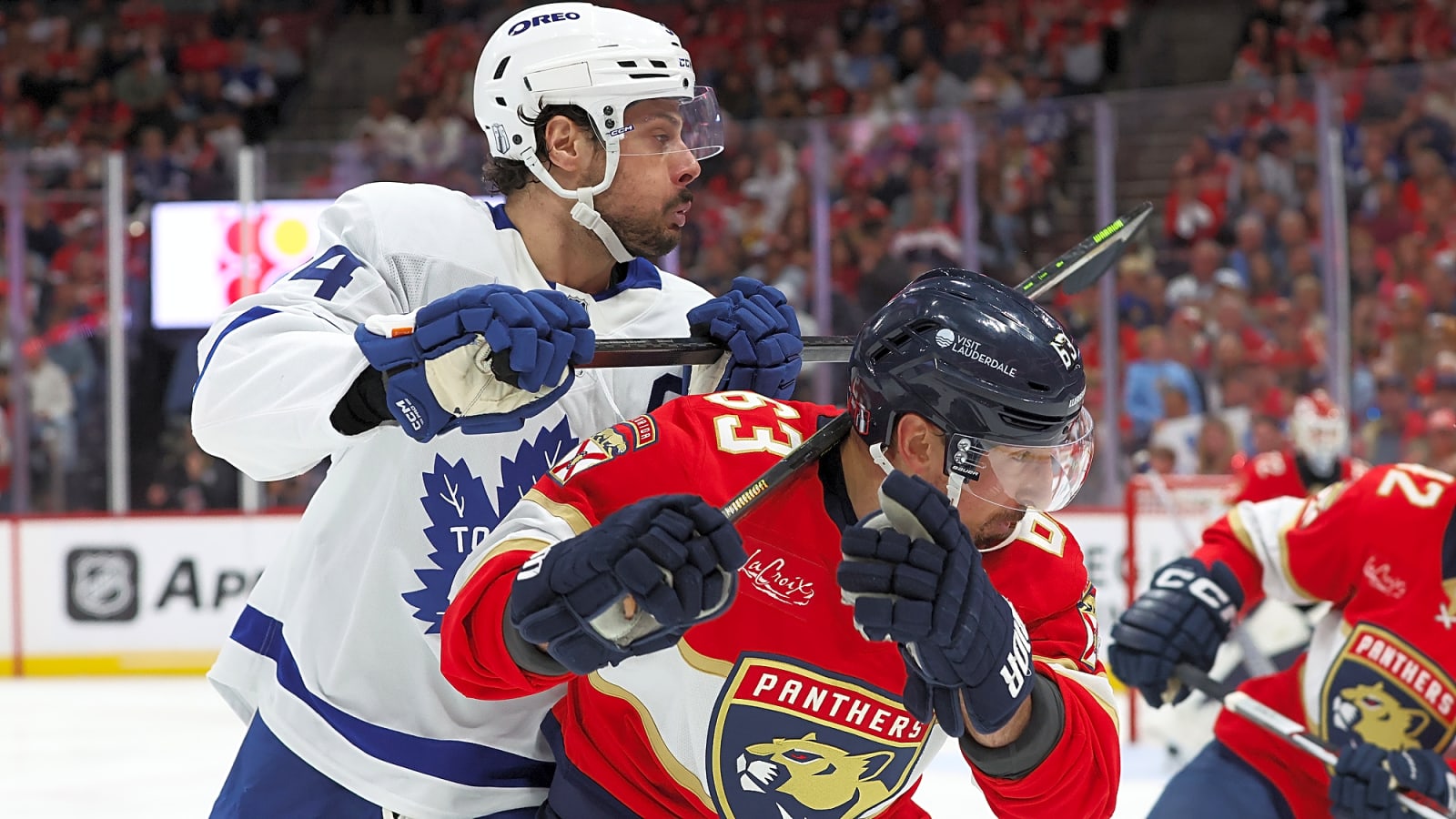 Auston Matthews Exits Game After Taking Shot to the Face from Aleksander Barkov